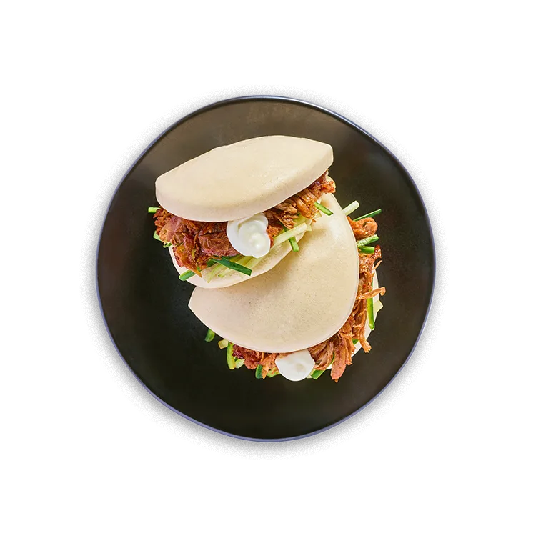 Wagamama hoisin pulled duck bao buns, cucumber, cherry hoisin and vegan mayo (may contain small bones)