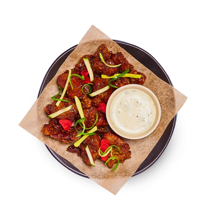 Wagamama hot honey fried chicken with yuzu, mixed pickles and zesty vegan mayo on the side