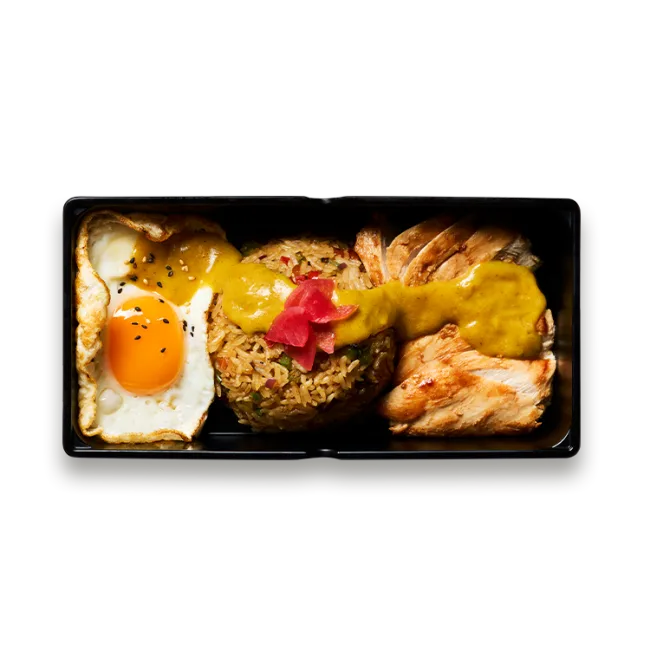 Wagamama nasi goreng lunch box, grilled chicken breast, teriyaki fried rice with peppers and onions and fried egg