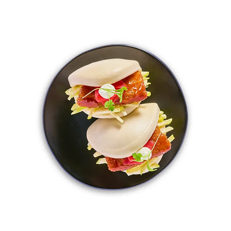 Wagamama tonkatsu pork bao buns, apple slaw, korean barbecue and okonomiyaki sauce